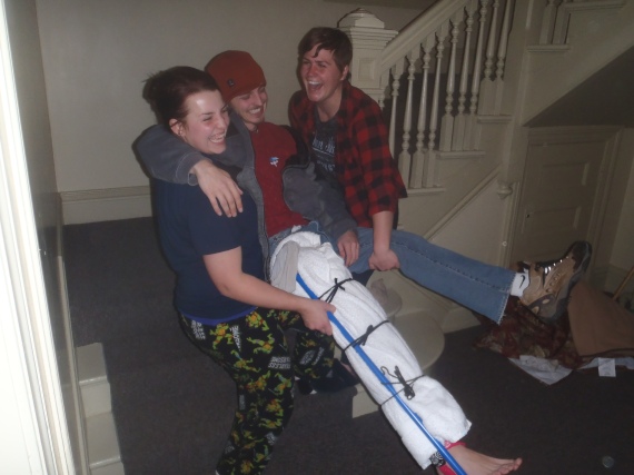 Amanda, Colin, and Ali, staging Colin's injury as a fall down the stairs